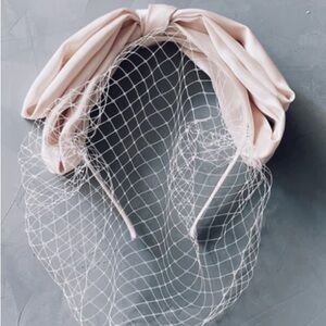 Elegant Pink Hair Accessory with Veil